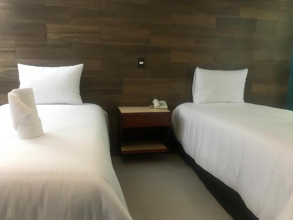 Malinalli Express Аписако Экстерьер фото